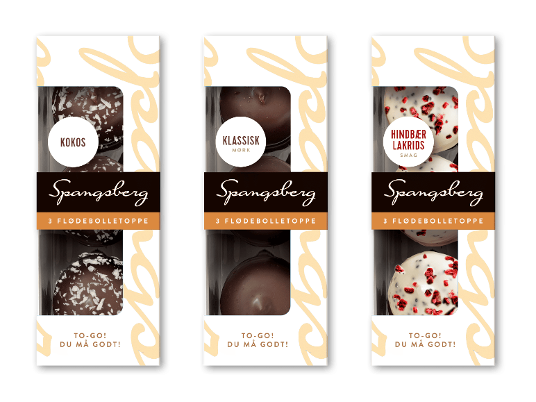 Tre pakker chokoladeovertrukne flødeboller med kokos, mørk chokolade og hindbær-lakrids smag.