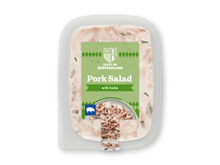 Svinesalat med krydderurter i en plastbøtte