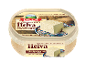 Vaniljehalva i en plastikbeholder, med stykker af halva på en tallerken.