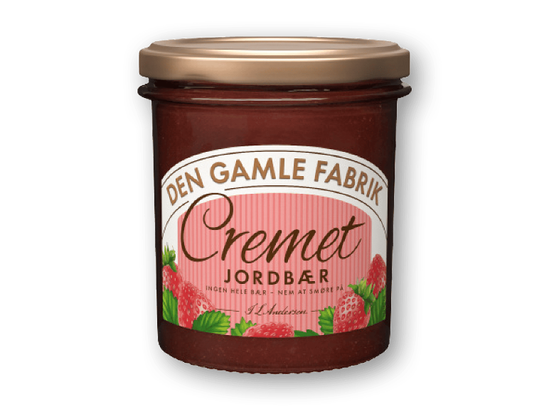 Glas med cremet jordbærmarmelade uden hele bær.