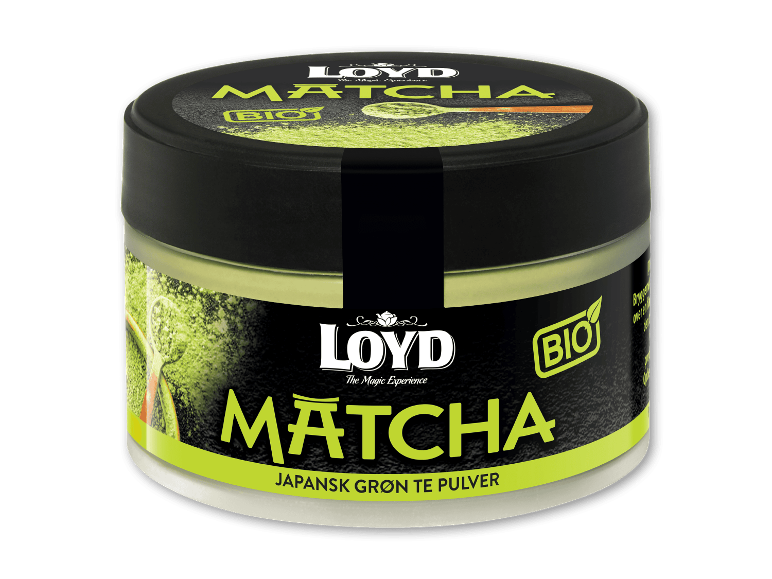 Beholder med grøn matcha te pulver, med teksten 'JAPANSK GRØN TE PULVER'.