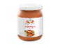 Glas kåldolmere i tomatsauce med et traditionelt mønster.