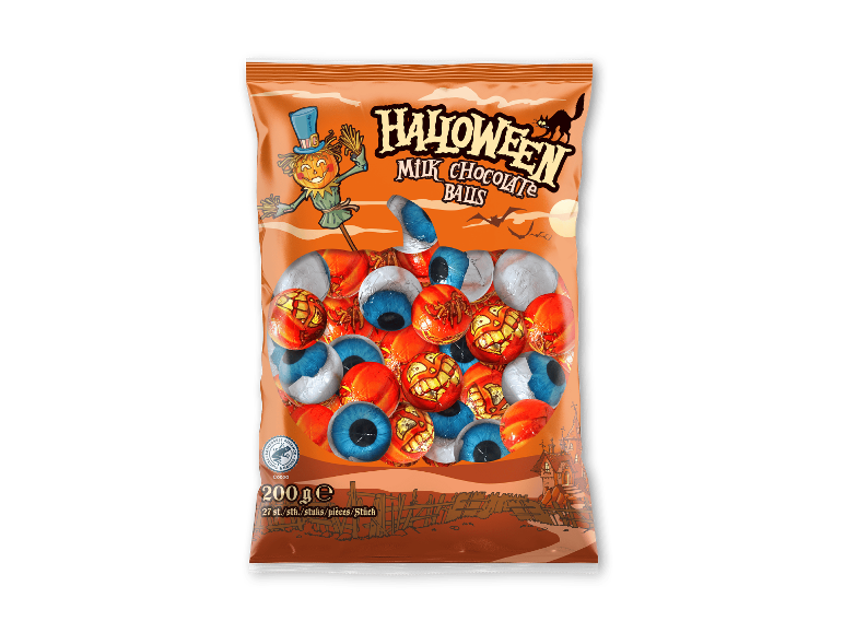 Halloween mælkechokoladekugler i en pose med et græskarformet vindue.