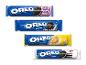 Fire forskellige pakker Oreo-kiks, herunder Original og Double Creme.