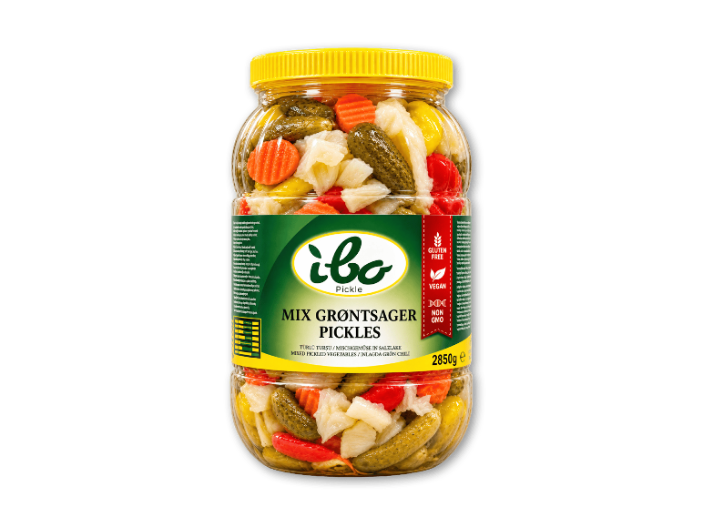 2850g glas med blandede syltede grøntsager med gult låg.