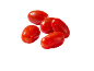 Gruppe af røde cherrytomater med vanddråber
