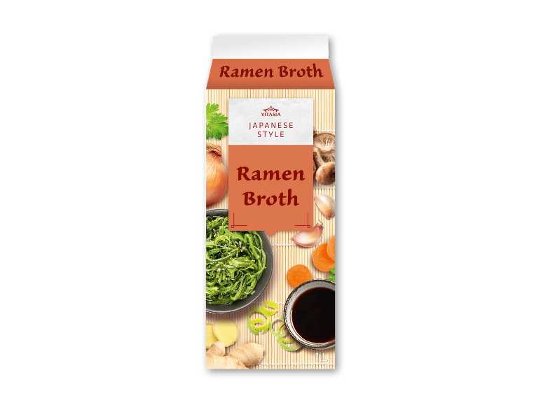 Karton med japansk ramenbouillon med ingredienser som tang, løg, svampe og ingefær.