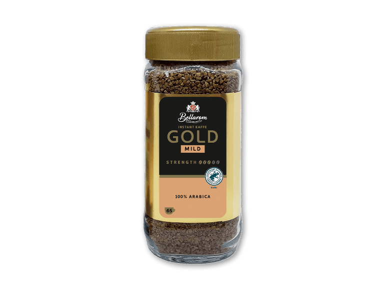 Glasbeholder med instantkaffe med guldlåg og etiket, der angiver 'Gold Mild' og '100% Arabica'.