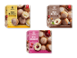 Tre æsker med frosne mini-Berliner-bursche med vanilje-, hasselnød- og hindbærfyld.