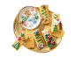 Julekiks, dekoreret med festlige figurer på et guldfad.