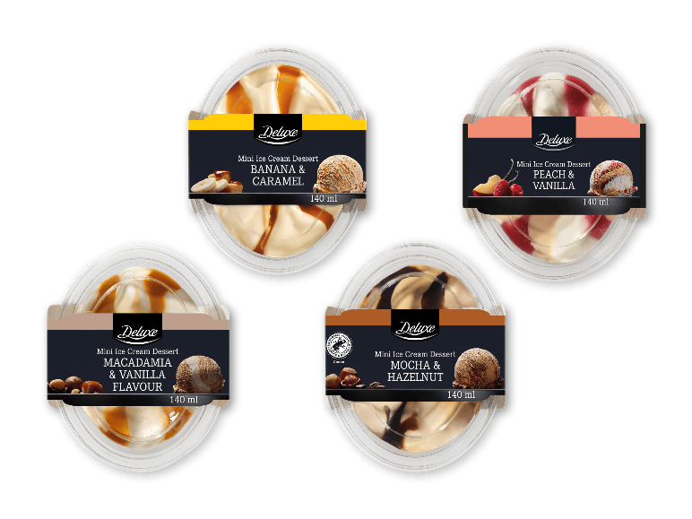 Fire mini-isdesserter i 140 ml bægre med forskellige smage på en sort baggrund.
