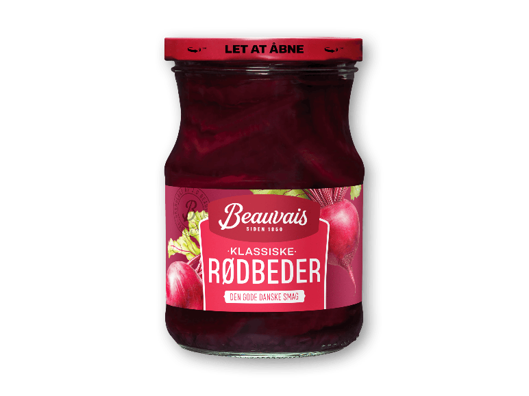 Et glas syltede rødbeder med rød etiket og låg.