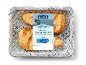 Panerede fiskefileter, Fish & Chips stil, i en bakke med avispapirforing.