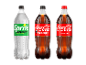 Tre store sodavandsflasker: en klar citron-lime zero sukker, to cola, en zero sukker og en original smag.
