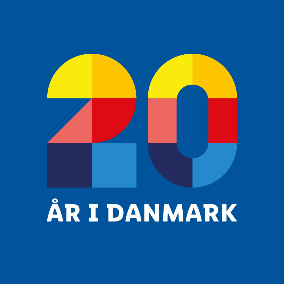 Et logo med tallet 20 i farverige blokke og teksten 'ÅR I DANMARK'.