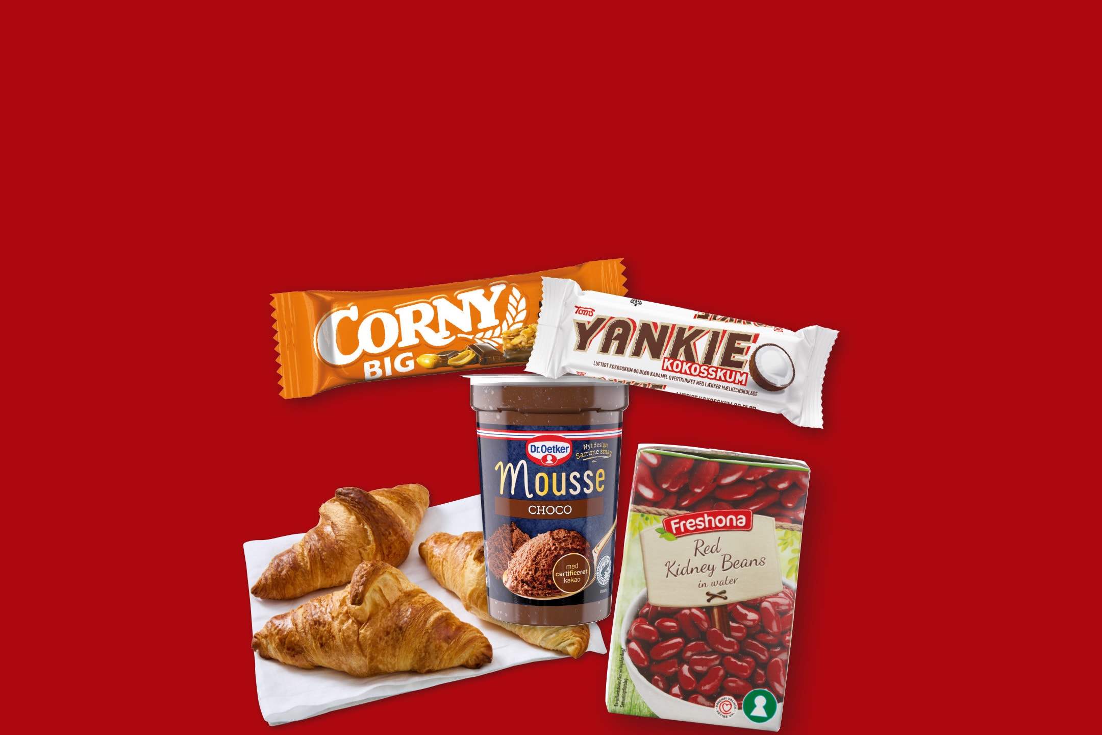 En chokoladebar, en kokosbar, chokolademousse, croissanter og røde kidneybønner på rød baggrund.