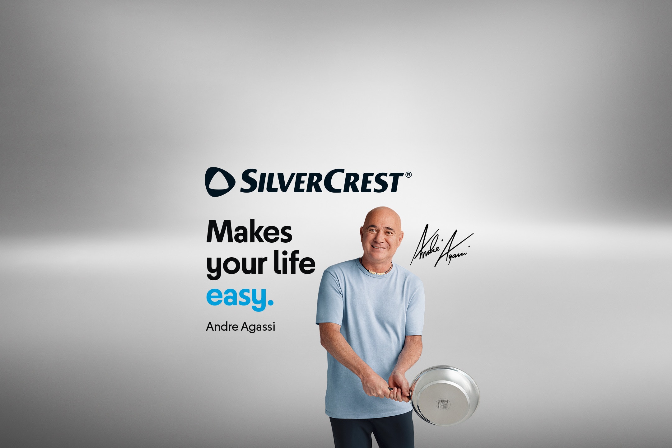 Andre Agassi holder en stegepande, med teksten 'Makes your life easy'.