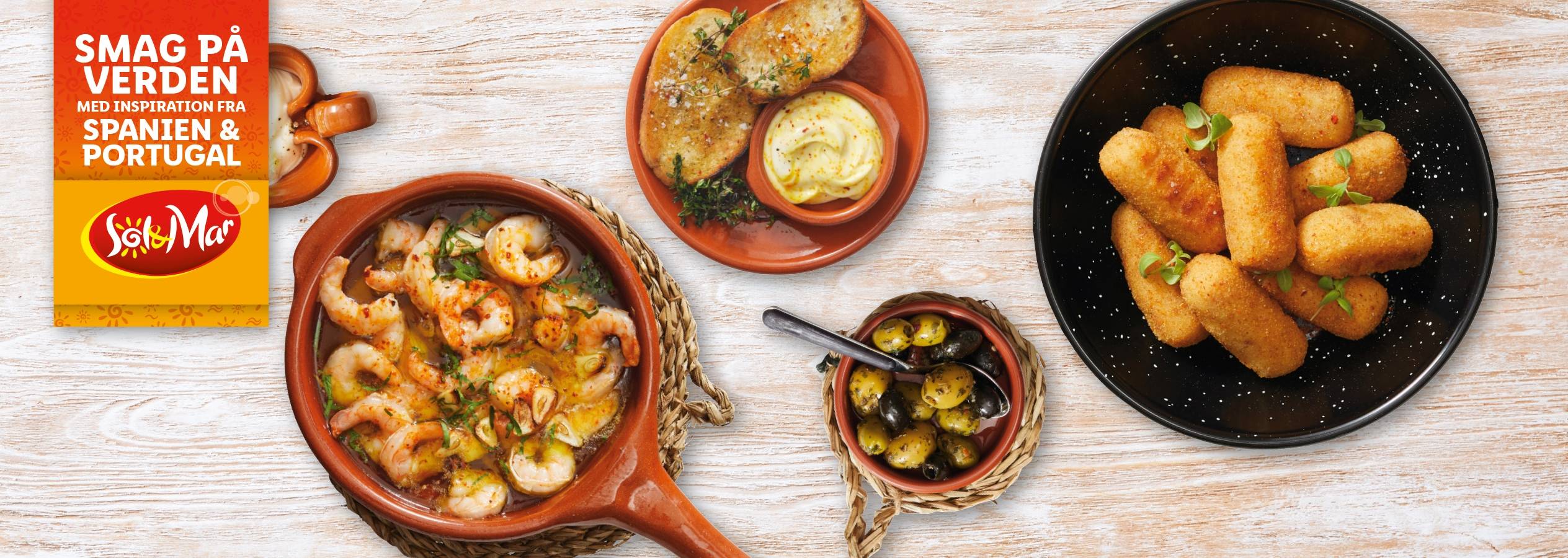 Sol&Mar præsenterer spanske og portugisiske retter: rejer, croquetter, oliven og brød.