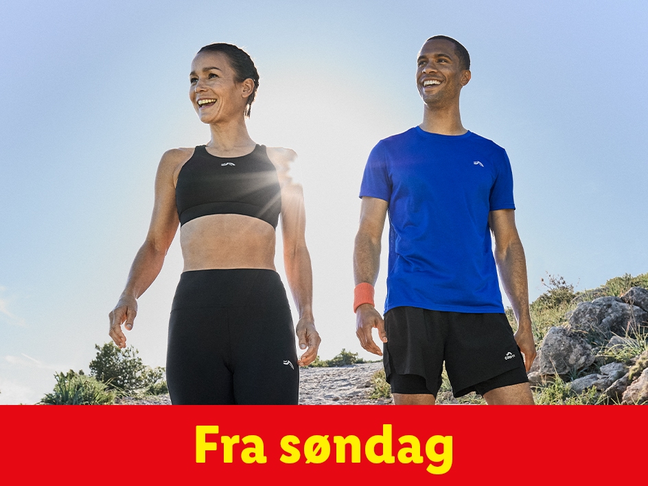 En mand og en kvinde i løbetøj fra Craft går i et landskab. Tilgængeligt fra søndag.