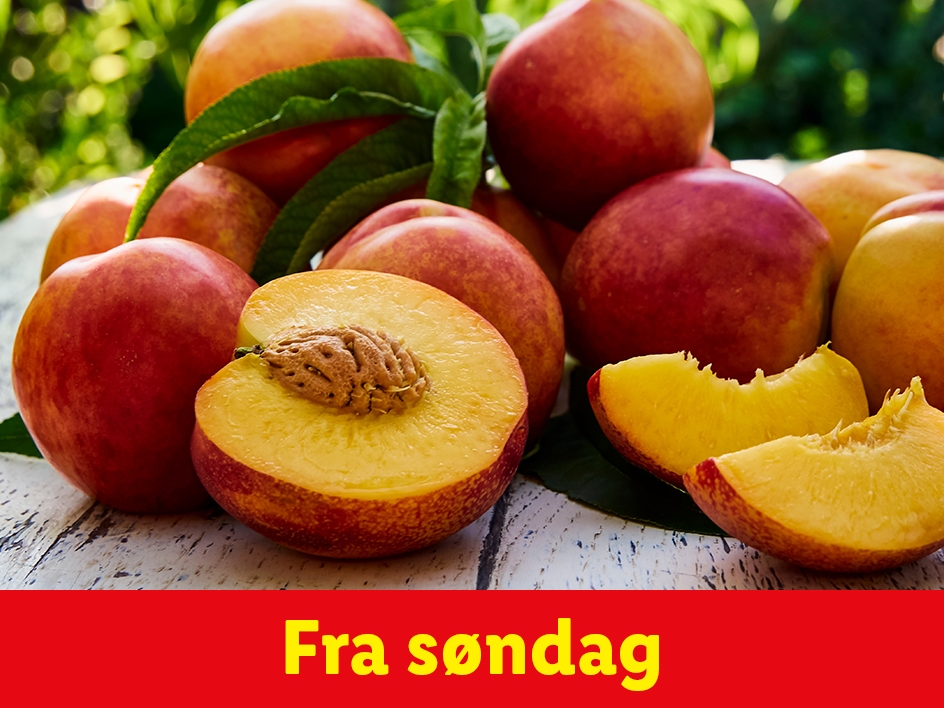 Ferskner på et træbord med teksten 'Fra søndag'.