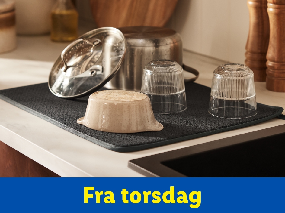 Et mørkegråt tørrestativ med skåle og glas, klar til brug fra torsdag.